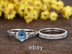 4CT Oval Cut Created Blue Topaz Bridal Band Trio Ring Set 14K White Gold Plated